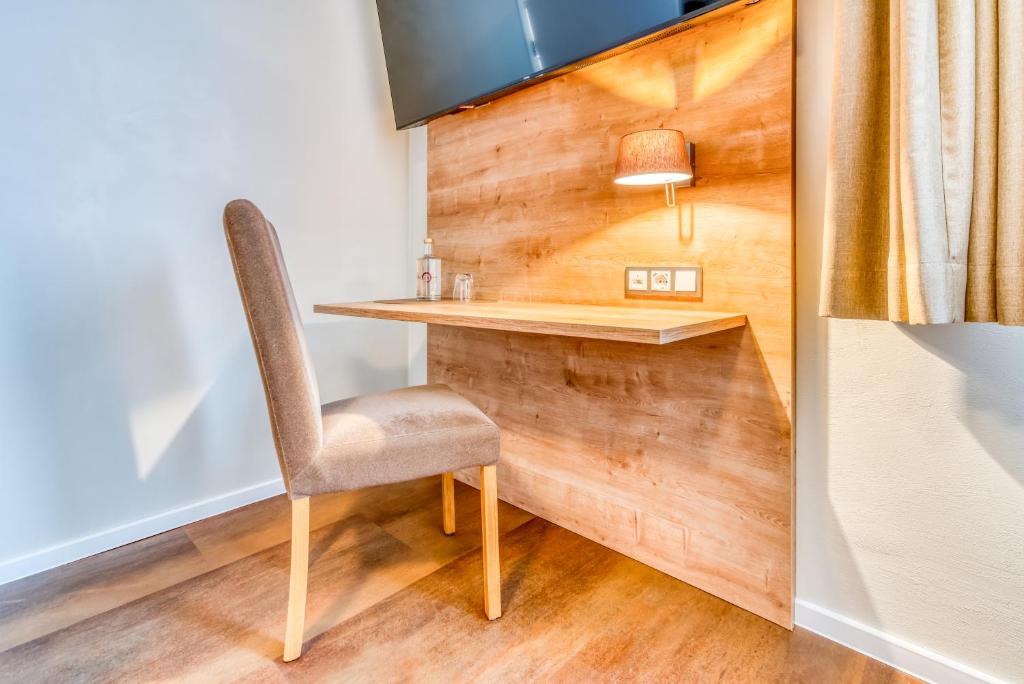 TV a/nebo společenská místnost v ubytování Guesthouse Beckmann