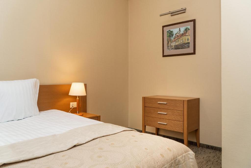 Postel nebo postele na pokoji v ubytování Mabre Residence