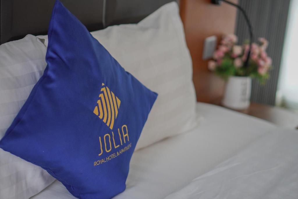 Postel nebo postele na pokoji v ubytování Jolia Hotel Danang Beach