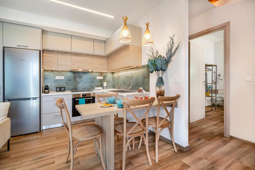 Kuchyň nebo kuchyňský kout v ubytování Elounda Buena Vista Apartments