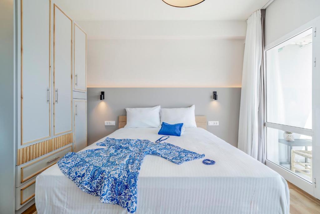 Postel nebo postele na pokoji v ubytování Elounda Buena Vista Apartments