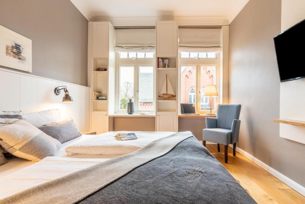 TV a/nebo společenská místnost v ubytování Logierhaus K15 Appartement 8