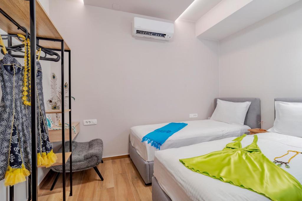 Postel nebo postele na pokoji v ubytování Elounda Buena Vista Apartments