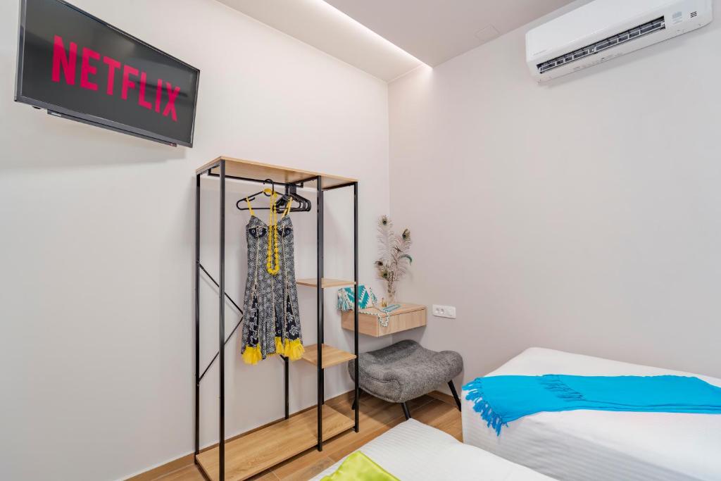Postel nebo postele na pokoji v ubytování Elounda Buena Vista Apartments