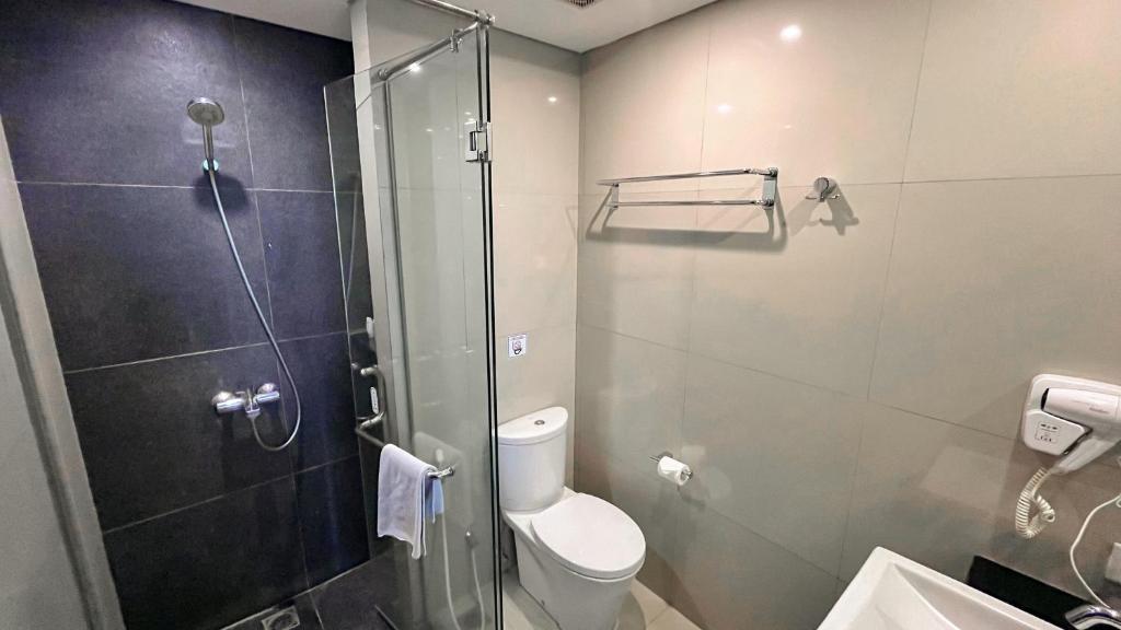 Koupelna v ubytování Grandia Hotel