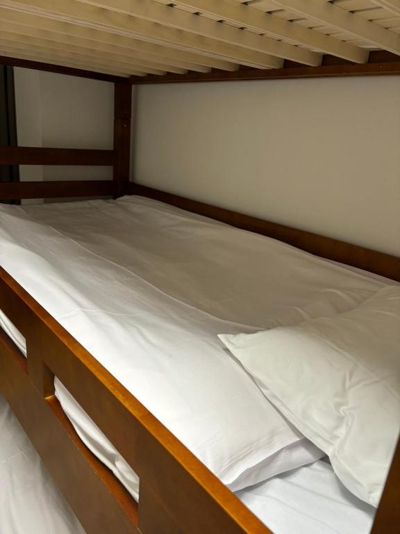 Postel nebo postele na pokoji v ubytování HARMONY HOTEL Urawa