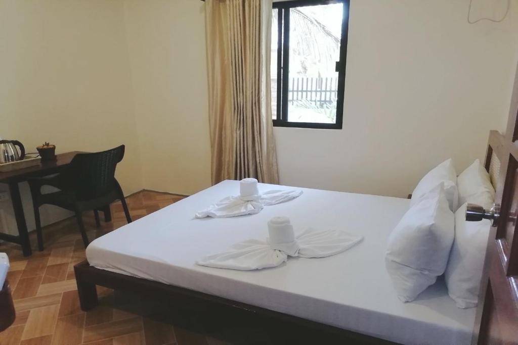 Katil atau katil-katil dalam bilik di Avila's Hostel Moalboal near Beach