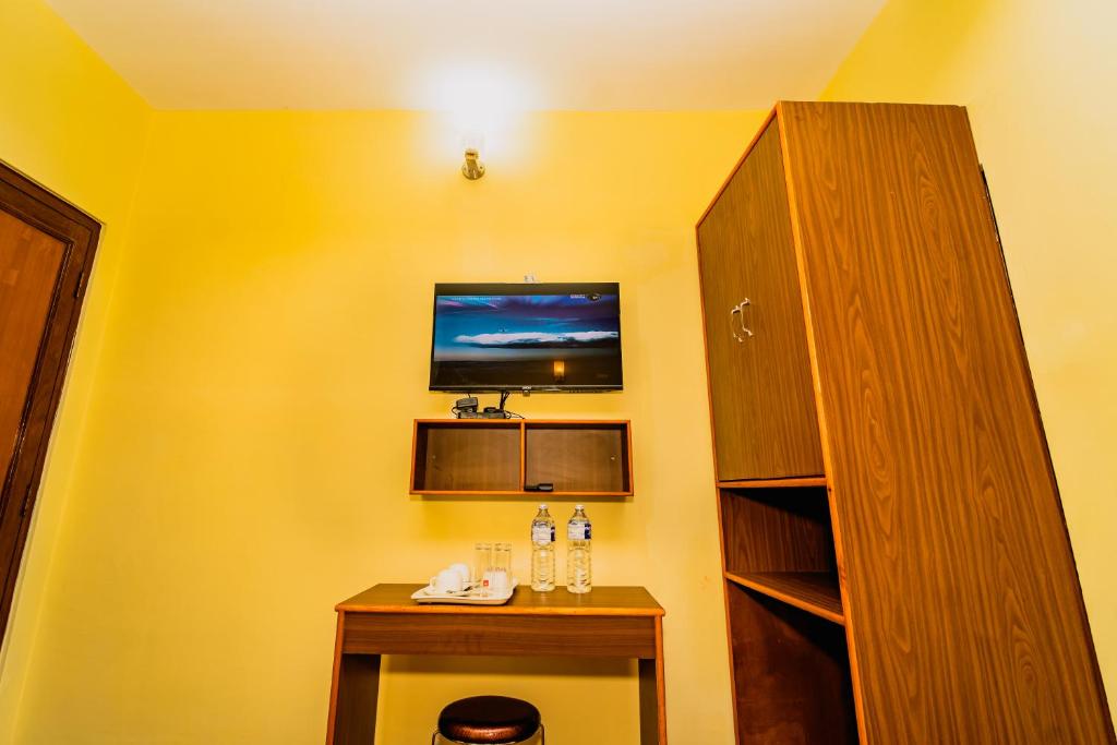 Kuhinja oz. manjša kuhinja v nastanitvi Hotel Aashraya Home