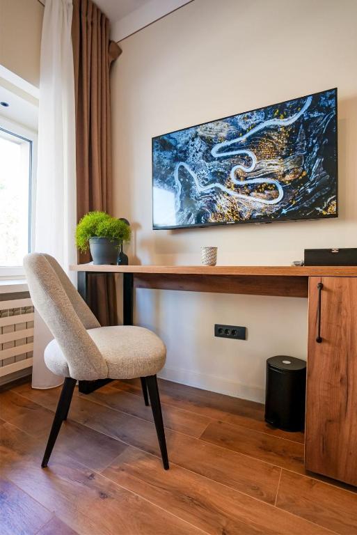 TV a/nebo společenská místnost v ubytování Simma Luxury Apartments & Rooms