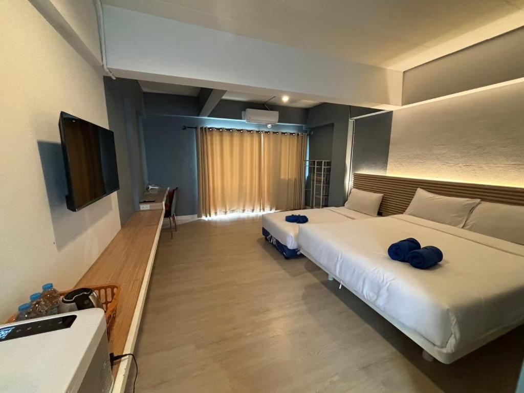 
Deluxe Triple Room
