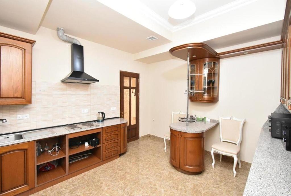 Kuchyň nebo kuchyňský kout v ubytování Homestay Hotel