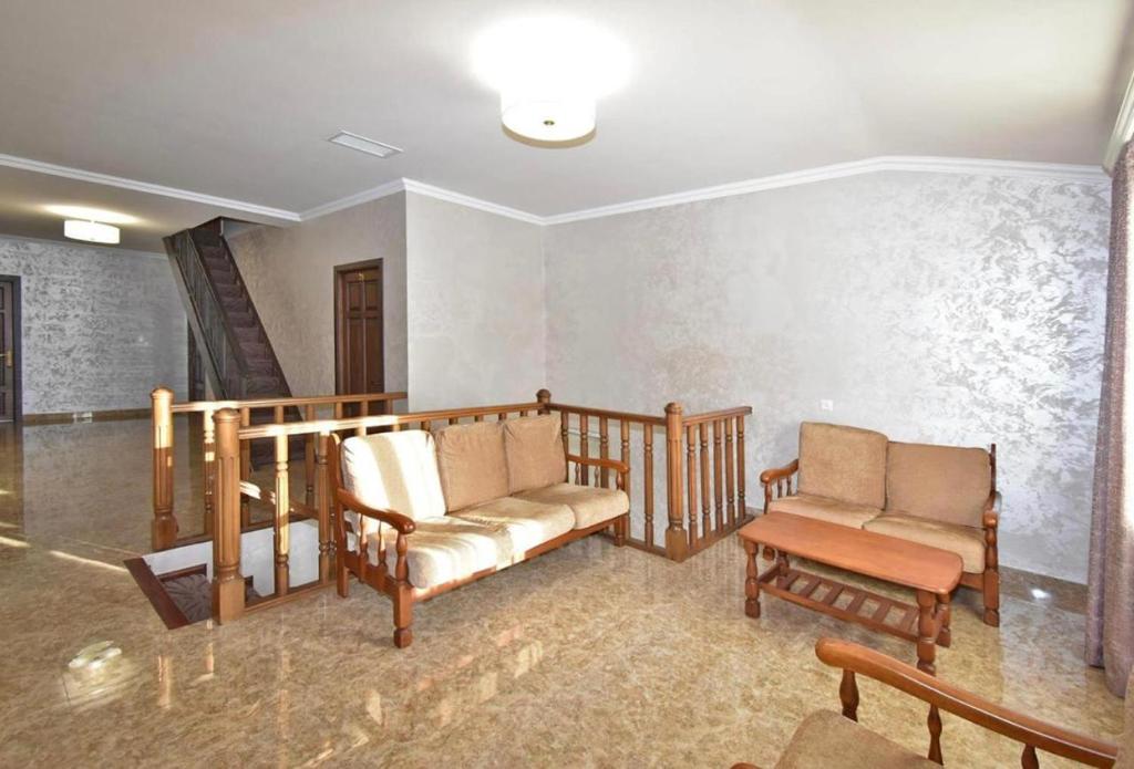 Posezení v ubytování Homestay Hotel