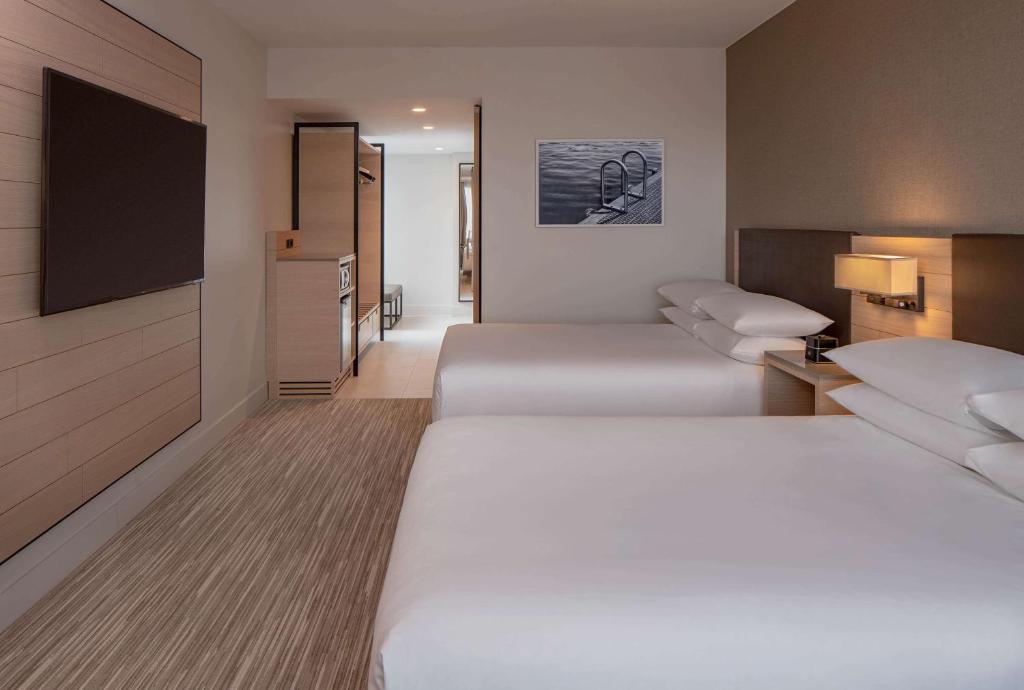Postel nebo postele na pokoji v ubytování Hyatt Regency Seattle