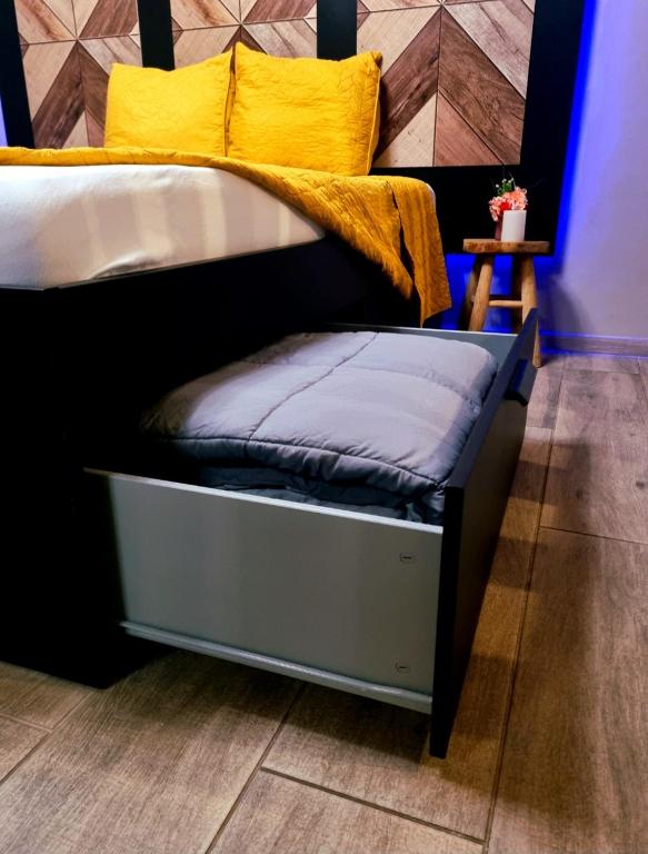 Postel nebo postele na pokoji v ubytování Aslyra "Appart-hôtel"
