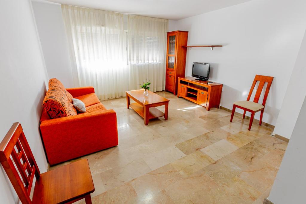 TV a/nebo společenská místnost v ubytování Apartamentos Aixa II