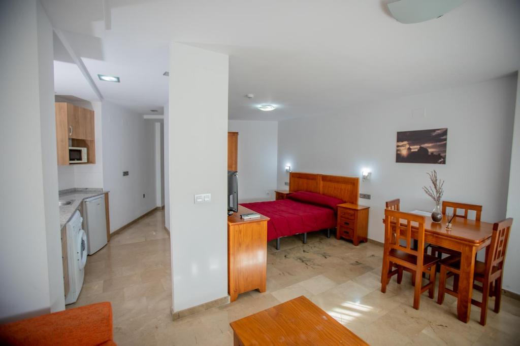 Postel nebo postele na pokoji v ubytování Apartamentos Aixa II