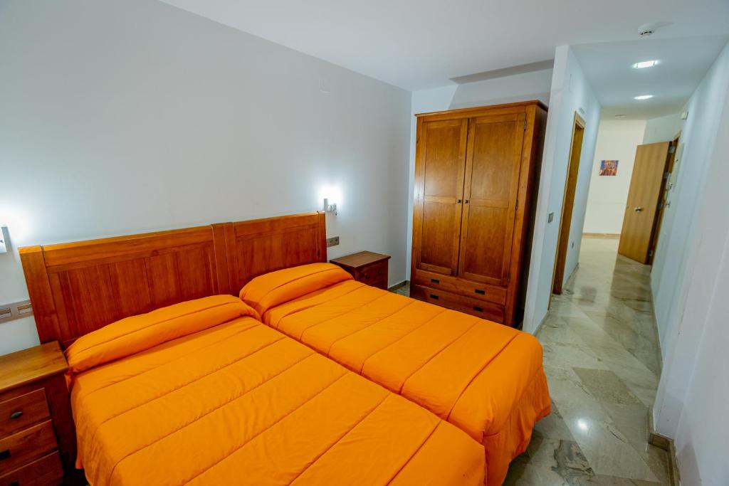 Postel nebo postele na pokoji v ubytování Apartamentos Aixa II