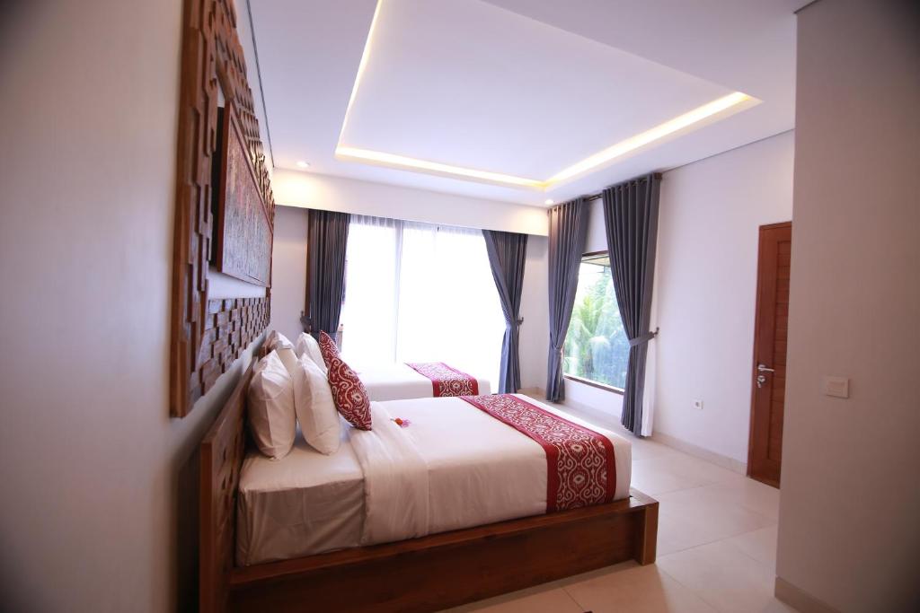 Postel nebo postele na pokoji v ubytování Tabeng Private Villa