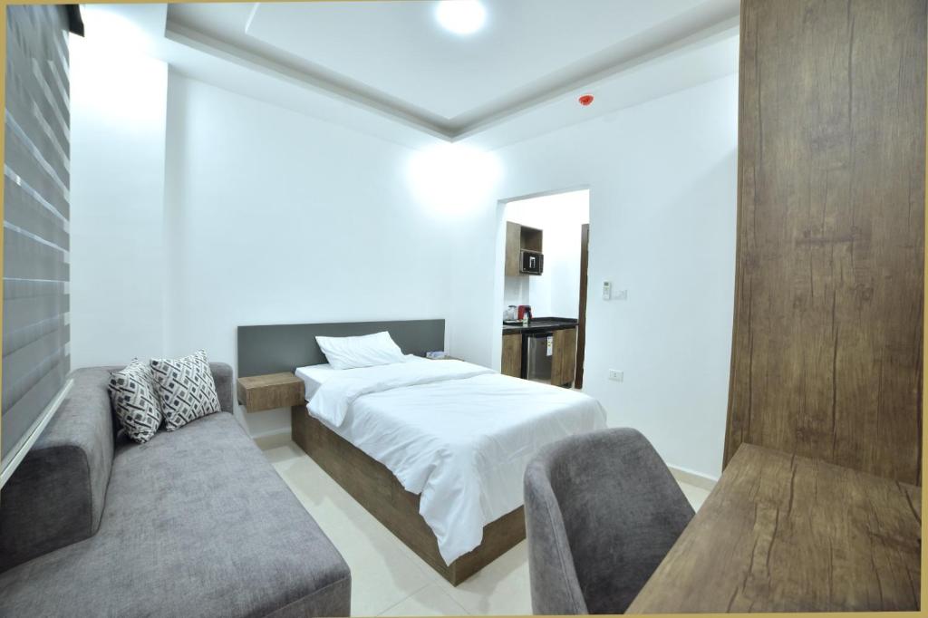 Postel nebo postele na pokoji v ubytování رمّ للأجنحة Rum Royal Suites