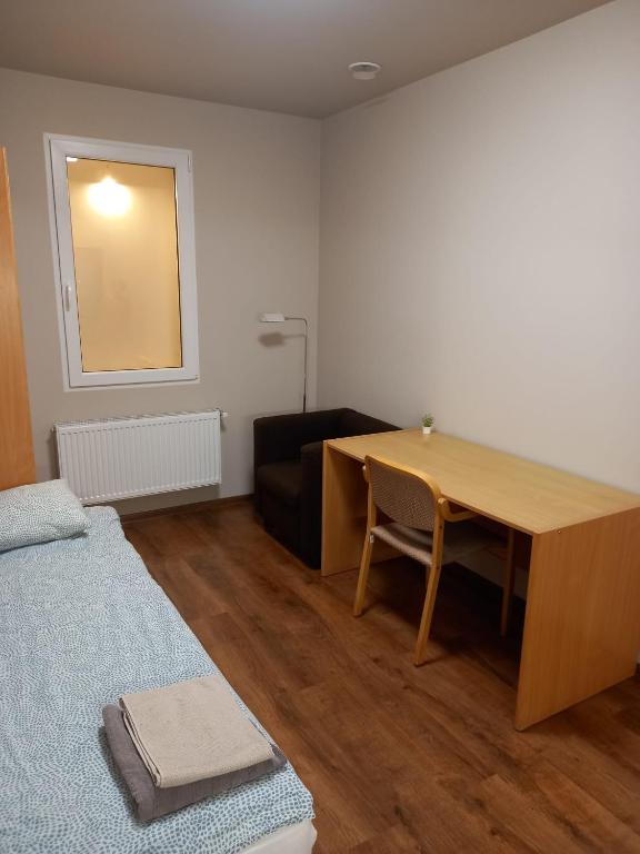 Postel nebo postele na pokoji v ubytování RVR Smart Apartments Riga with self Check-in