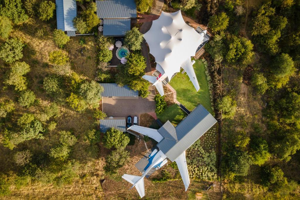 an overhead view of a house with a roof at Aerotel in Hoedspruit