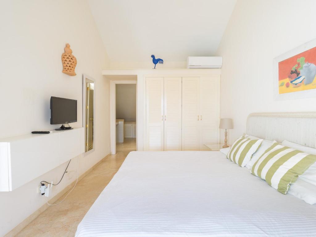 Posteľ alebo postele v izbe v ubytovaní BLUE MARLIN APARTMENT - GRAN CANARIA STAYS