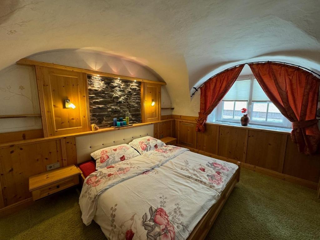 Postel nebo postele na pokoji v ubytování Apartment Theresa, Rauris