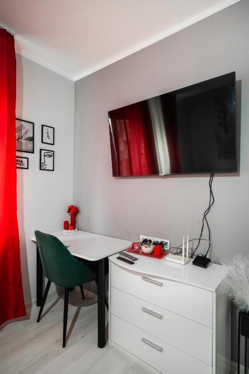 TV a/nebo společenská místnost v ubytování Feel Right at Home - Bright and Modern Apartment by Flat Mаnager