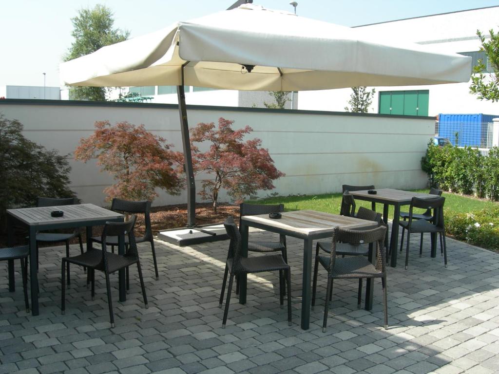 Patio nebo venkovní prostory v ubytování OneMhotel