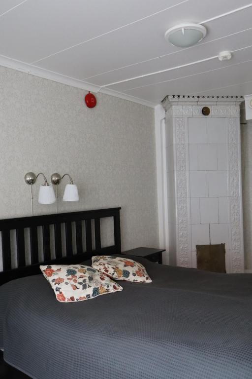 Postel nebo postele na pokoji v ubytování STF Hostel Mariestad