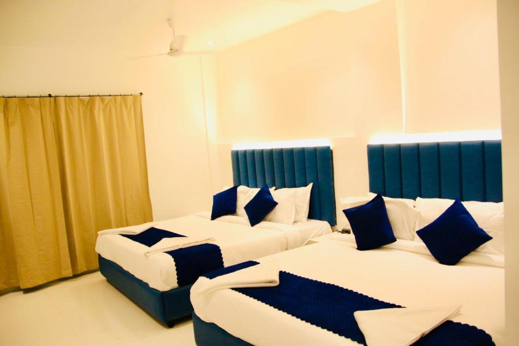 Postel nebo postele na pokoji v ubytování Brigade Hotels and Resorts