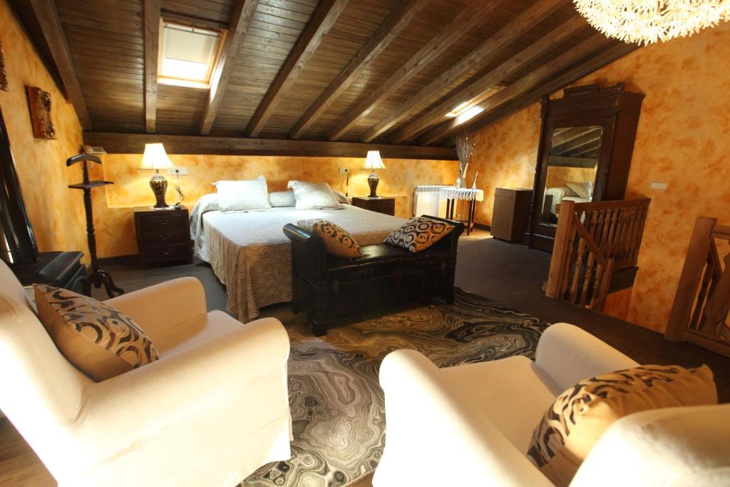 A bed or beds in a room at Posada Villa Maria