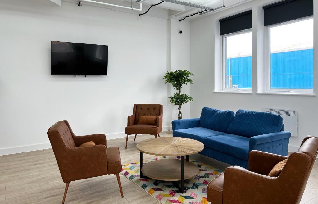 TV a/nebo společenská místnost v ubytování The Kaizen