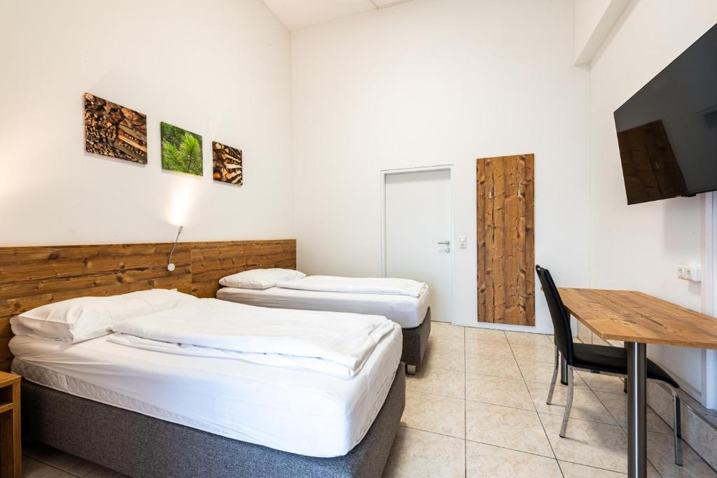 Postel nebo postele na pokoji v ubytování Apartment´s Marchtrenk