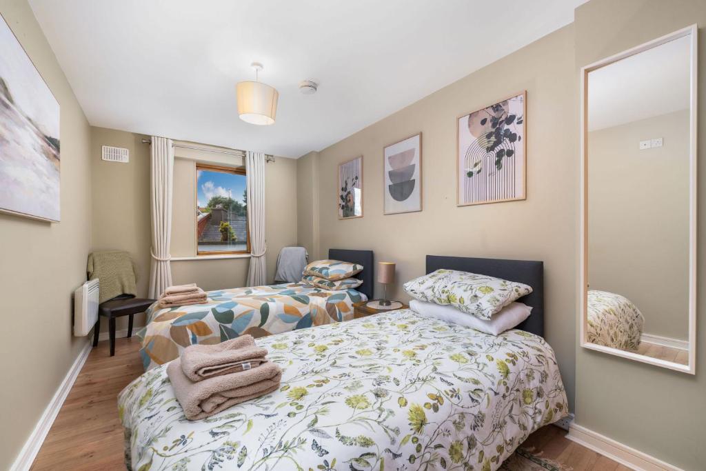 Postel nebo postele na pokoji v ubytování Apartment 453 - Clifden
