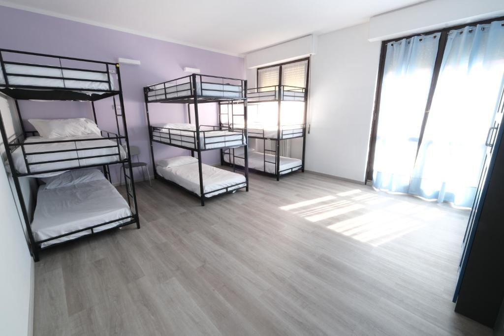 Posteľ alebo postele v izbe v ubytovaní Hostel 3