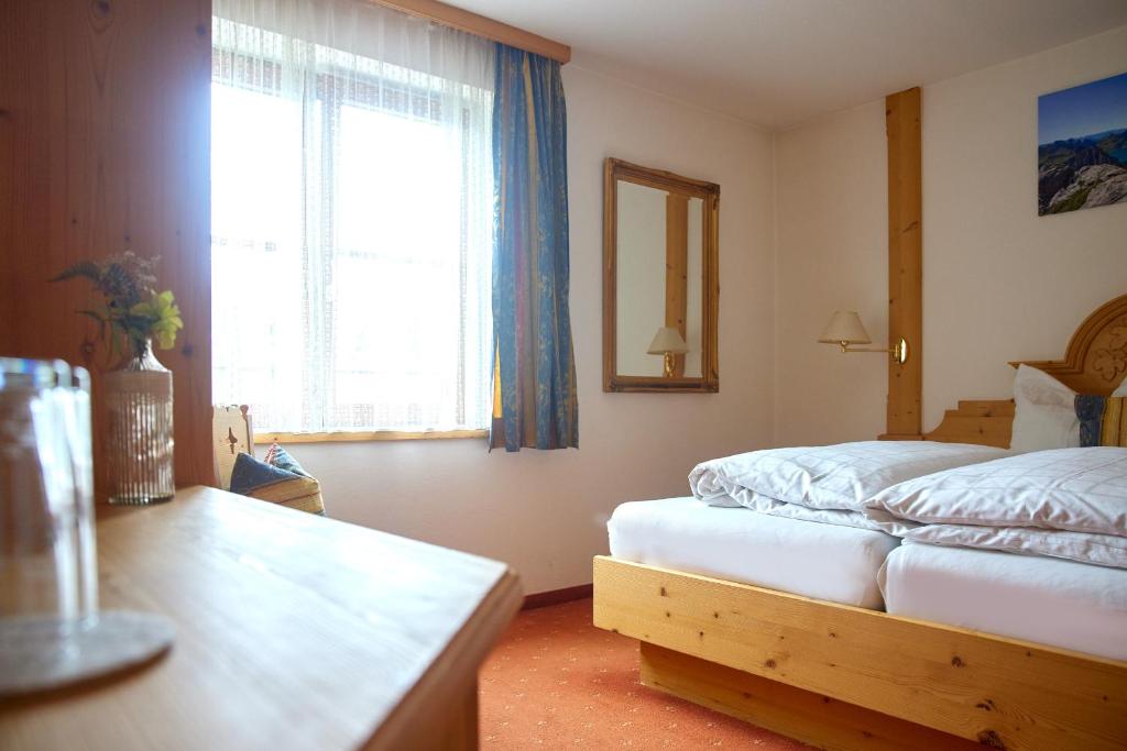 Postel nebo postele na pokoji v ubytování Montafon Moments