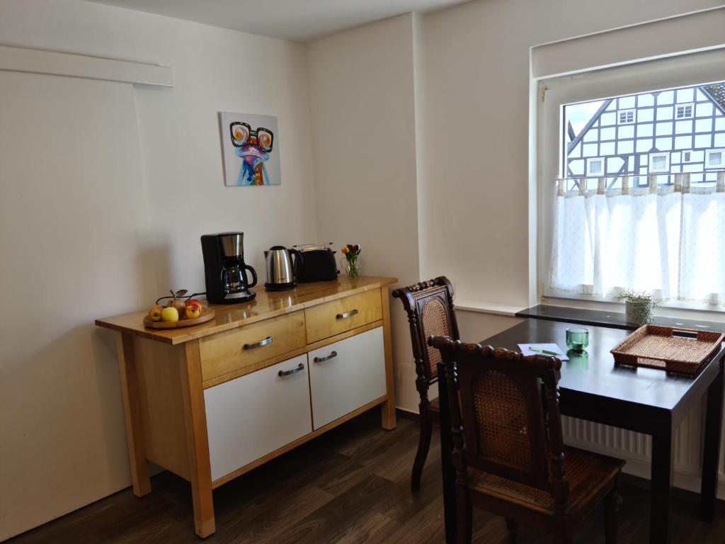 Kuchyň nebo kuchyňský kout v ubytování Pilgrims "Bert" moderne Wohnung 2 SZ top wifi