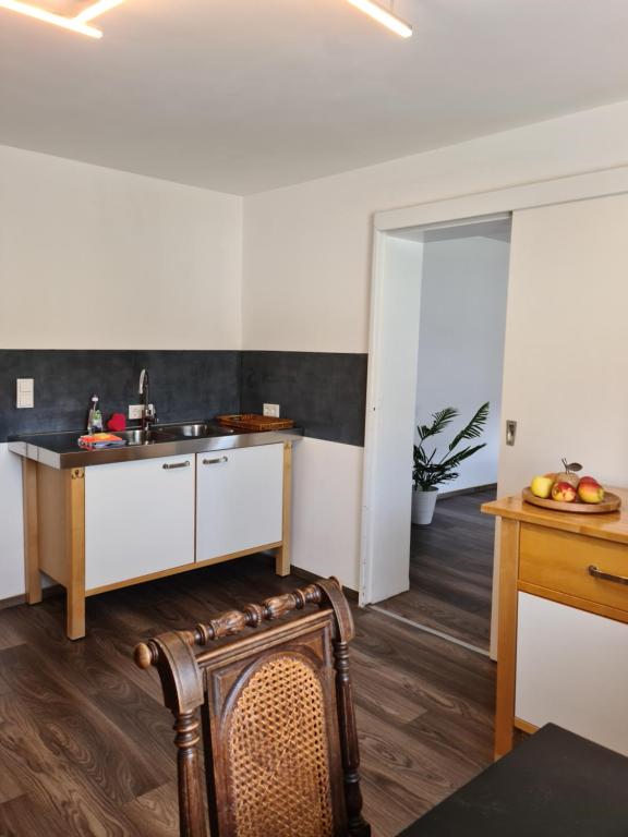 Kuchyň nebo kuchyňský kout v ubytování Pilgrims "Bert" moderne Wohnung 2 SZ top wifi