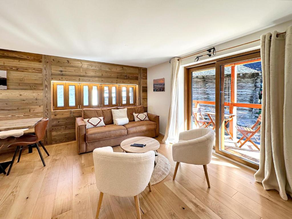 Posezení v ubytování Pilanous Residence - Junior Suite - Swiss Alps