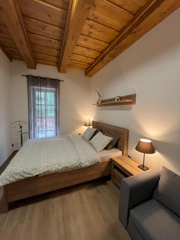 Postel nebo postele na pokoji v ubytování Apartmány La Šiška
