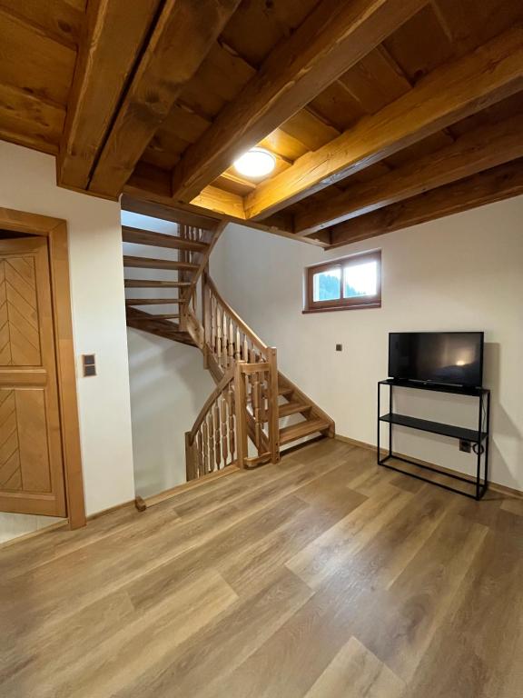 TV a/nebo společenská místnost v ubytování Apartmány La Šiška