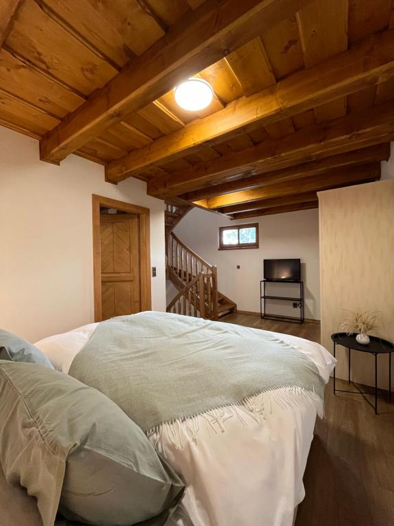 Postel nebo postele na pokoji v ubytování Apartmány La Šiška