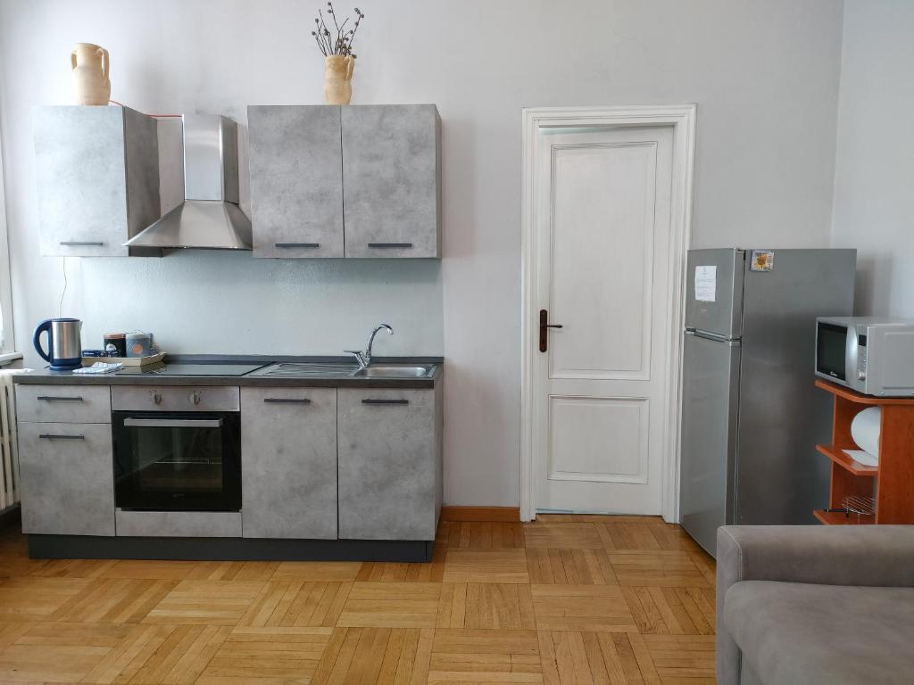 Kuchyň nebo kuchyňský kout v ubytování Villa Scalabrini
