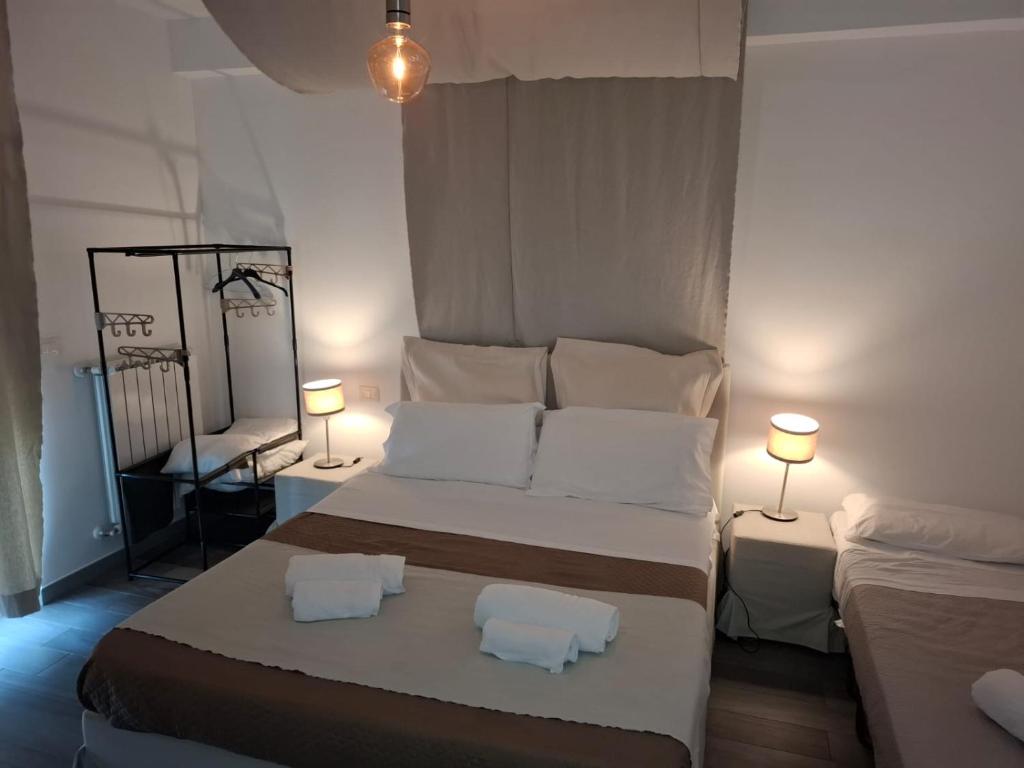 Postel nebo postele na pokoji v ubytování Airport Bari palese DELUXE 28