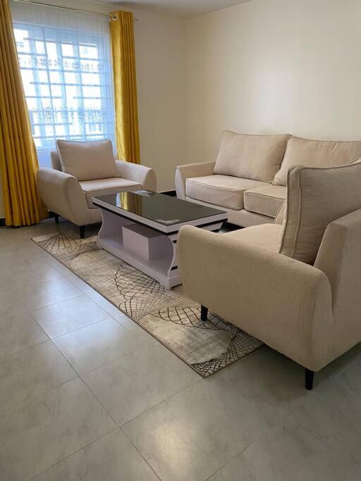 Ruang duduk di Olive Homes Modern & Stylish Suite - 2 bdrm