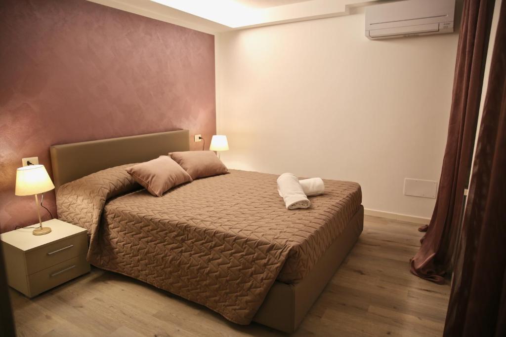 Postel nebo postele na pokoji v ubytování La Cipressina B&B