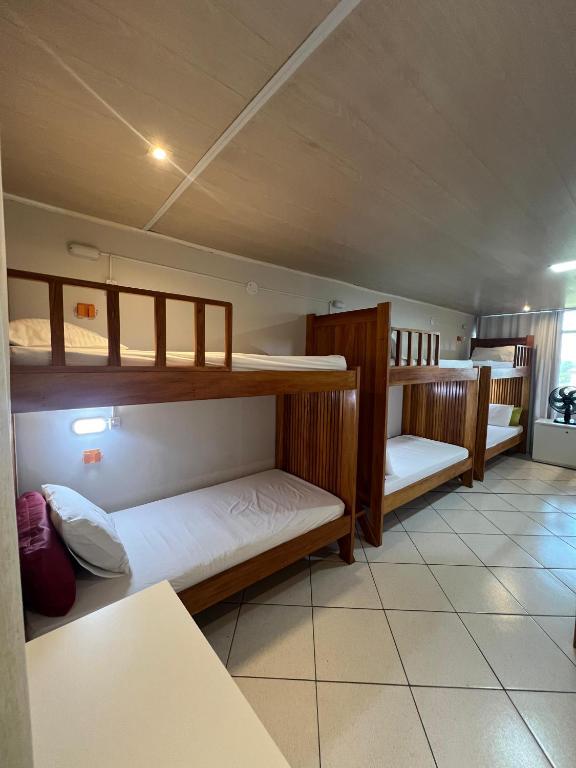 Postel nebo postele na pokoji v ubytování Hostel Da Jô