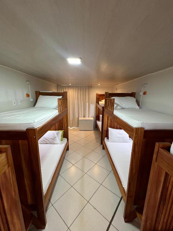 Postel nebo postele na pokoji v ubytování Hostel Da Jô