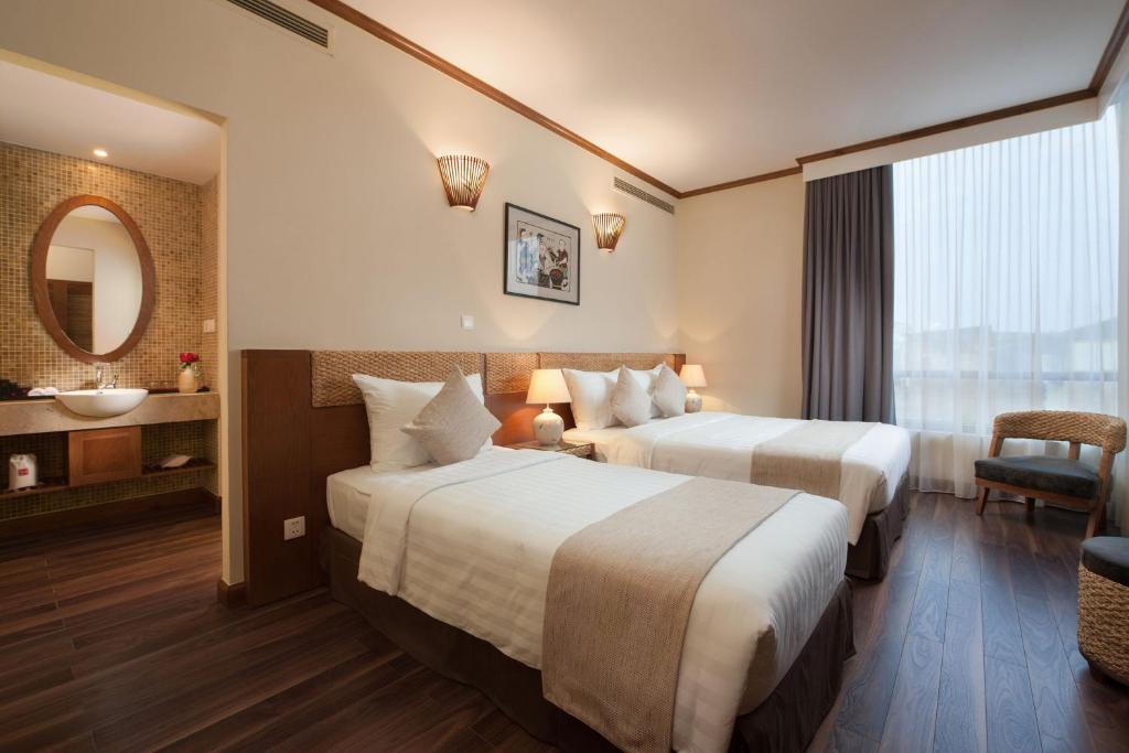 Deluxe Triple Room (3 Singles or 1 Double + 1 Single)